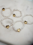 Handmade stretch ring with natural freshwater pearls and a gold-plated heart spacer – photo 3