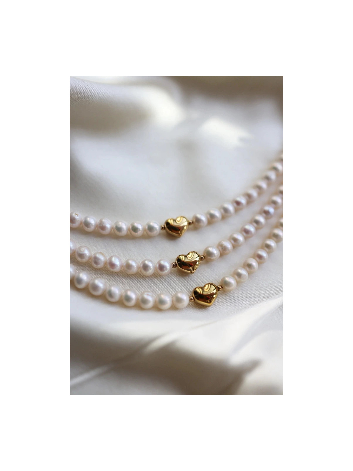 Freshwater pearl and hematite necklace with a gold heart-shaped stainless steel spacer, handmade