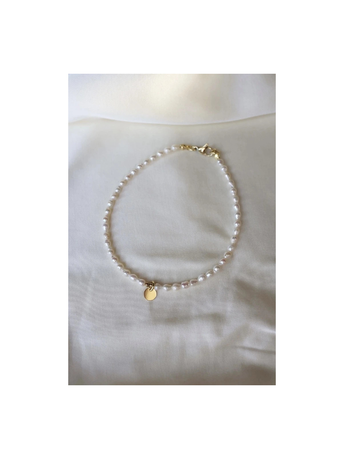 Anklet with natural freshwater pearls and hematite with a gold-plated silver charm, handmade