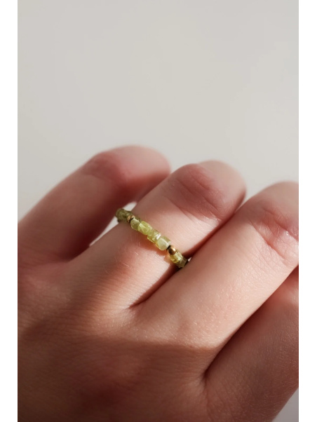Stretch ring made of tiny peridot and hematite cubes on elastic cord, adjusts to your finger size, handmade