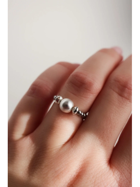 Stretch ring of hematite in two shades of silver strung on elastic cord, handmade