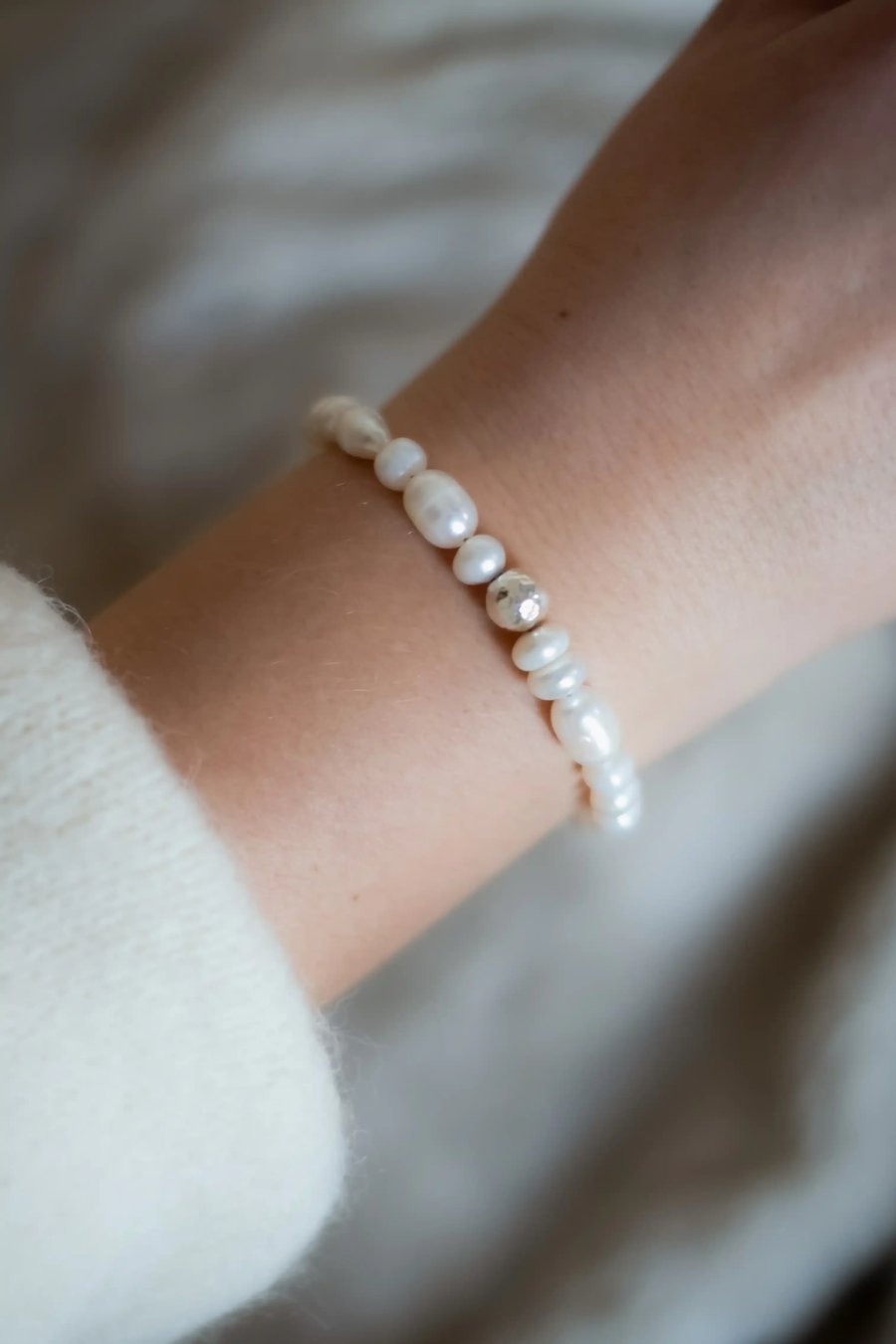 Adjustable cultured freshwater pearl bracelet with a crumpled silver bead and silver, handmade