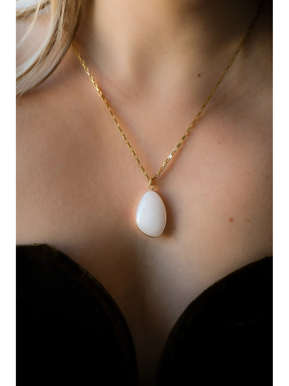 Necklace with a double-sided rock crystal pendant on a gold surgical steel chain, handmade