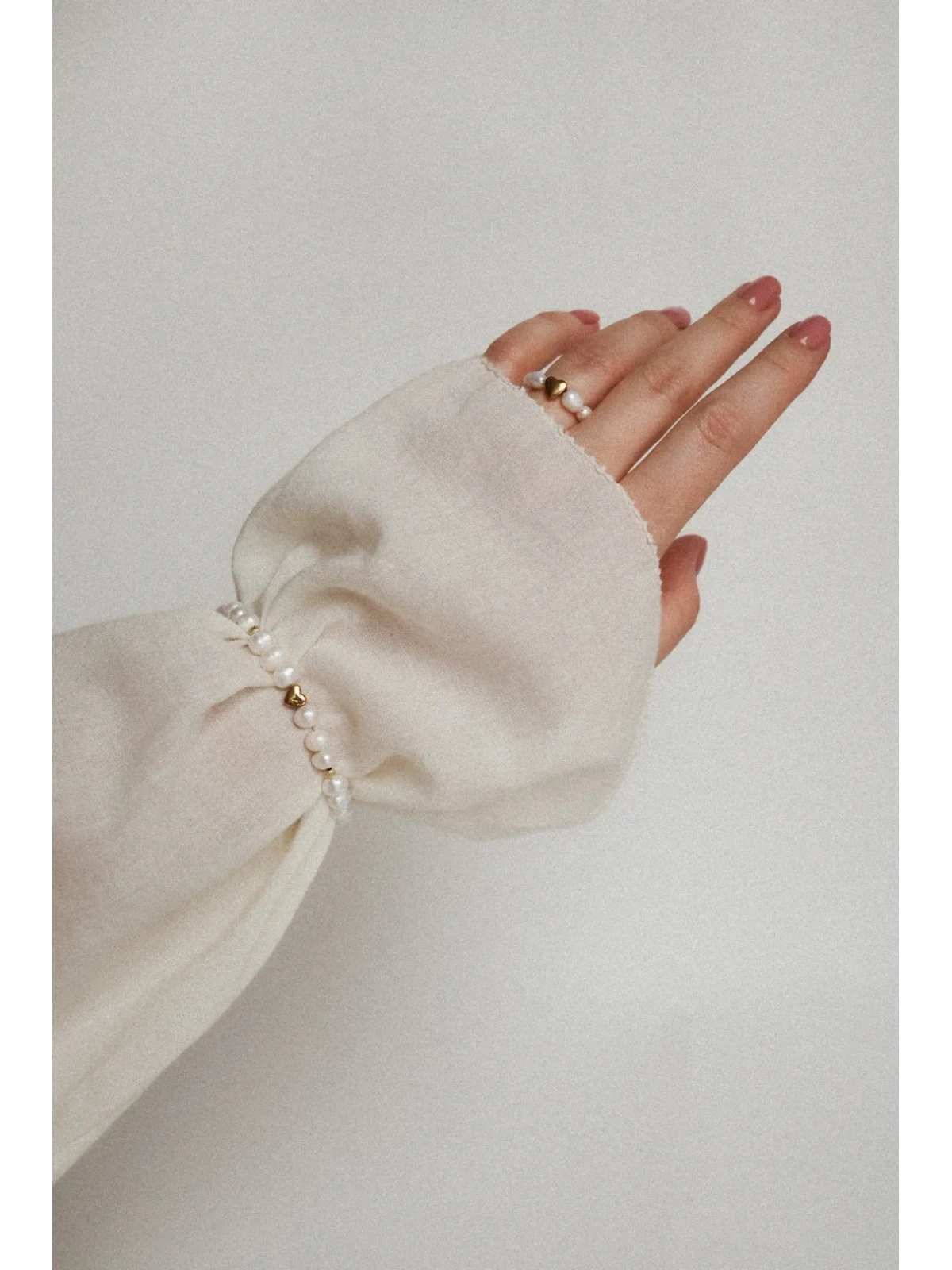 Bransoletka z pereł naturalnych z sercem ze złotego hematytu | Upiększaj