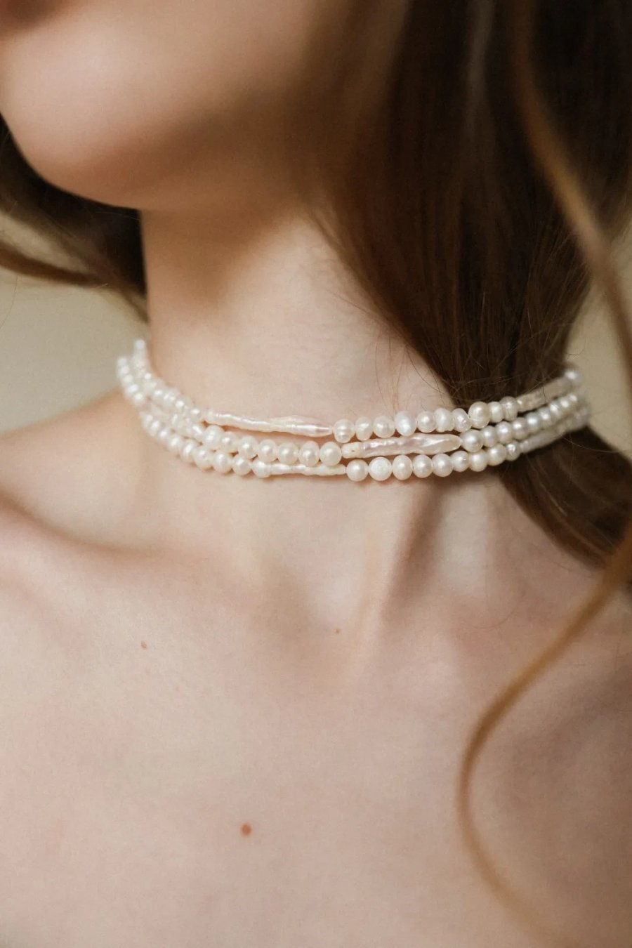 Handmade triple-strand cultured freshwater pearl choker with a surgical steel clasp, adjustable 37–43 cm