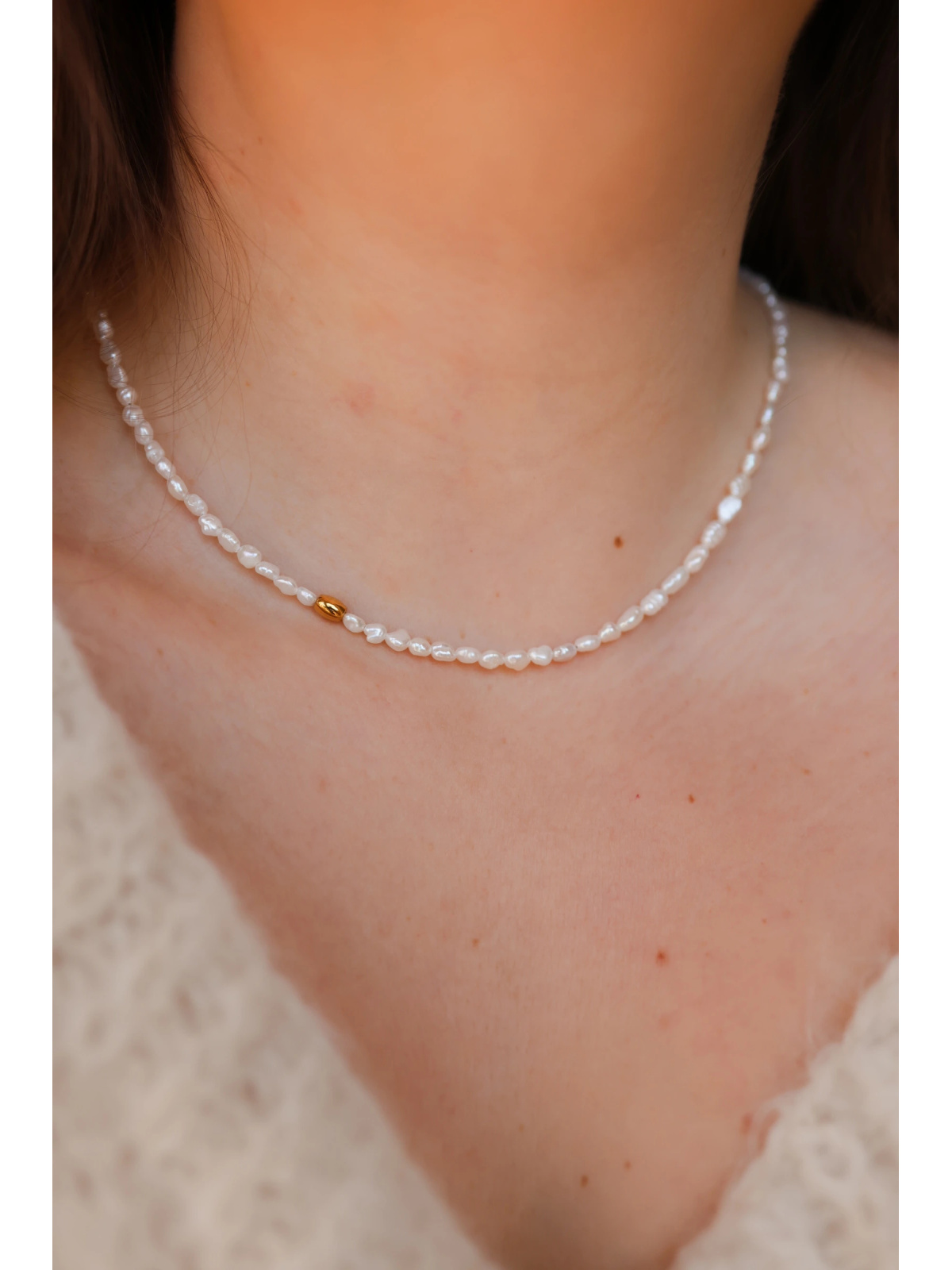 Delicate, subtle necklace of tiny pearls with a gold hematite spacer, handmade – photo 3