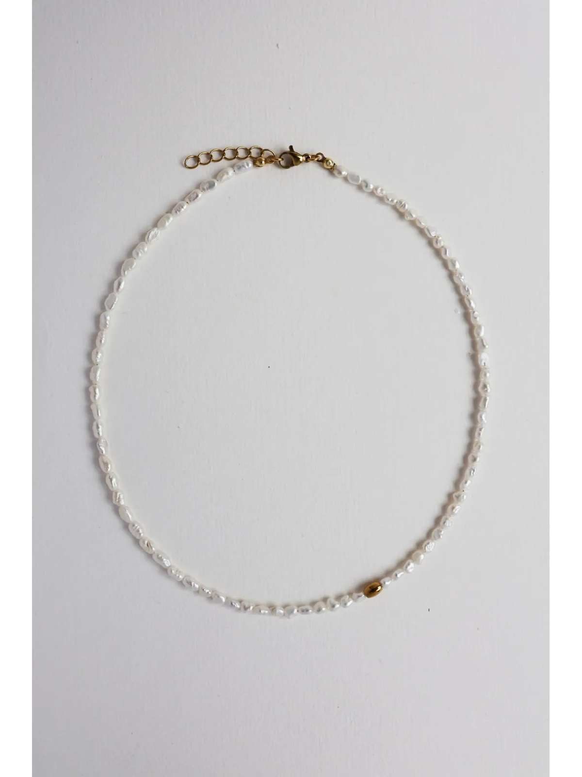 Delicate, subtle necklace of tiny pearls with a gold hematite spacer, handmade – photo 5