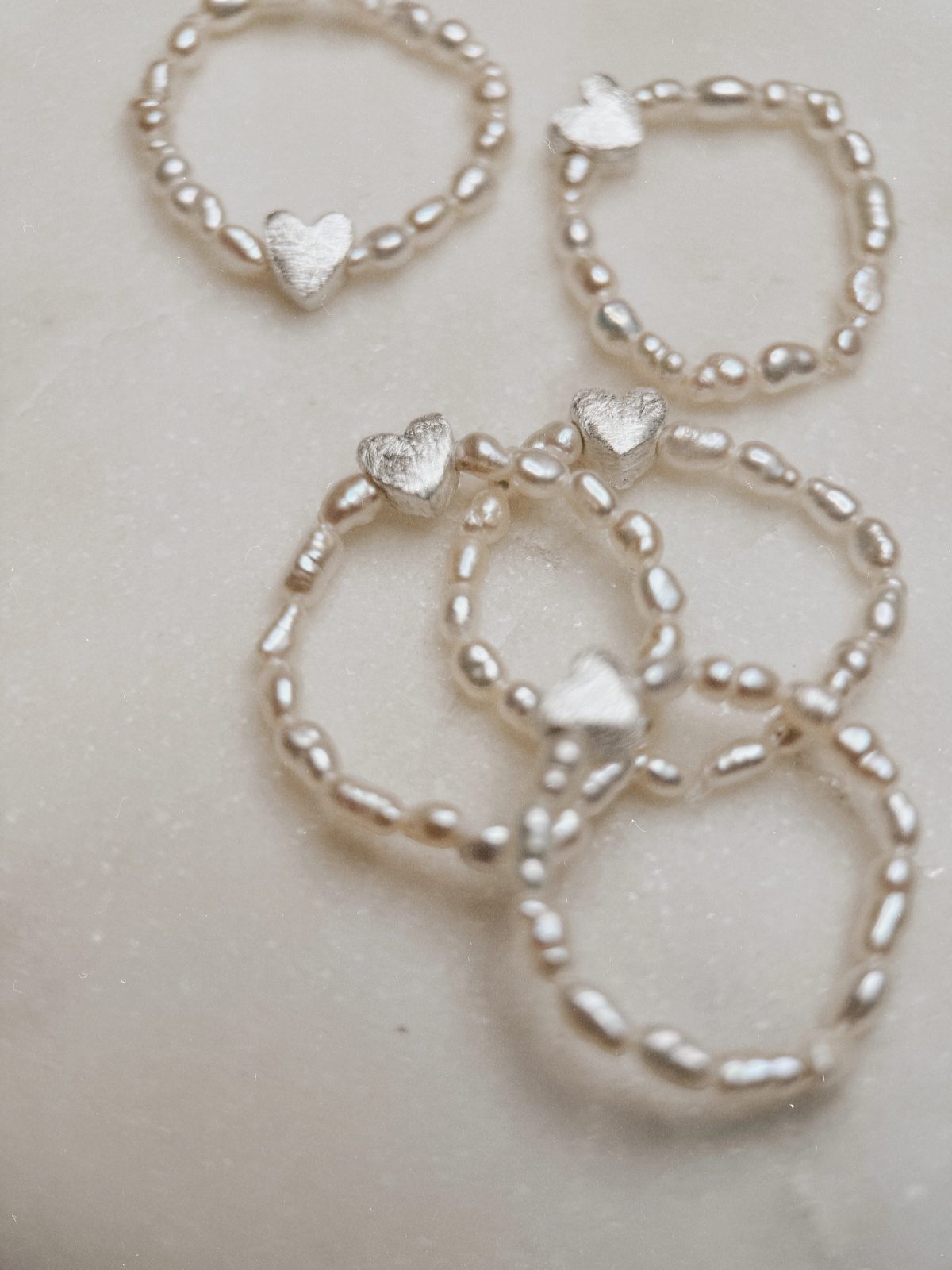 Adjustable ring of natural freshwater pearls on elastic cord with a 925 silver spacer, handmade – photo 3